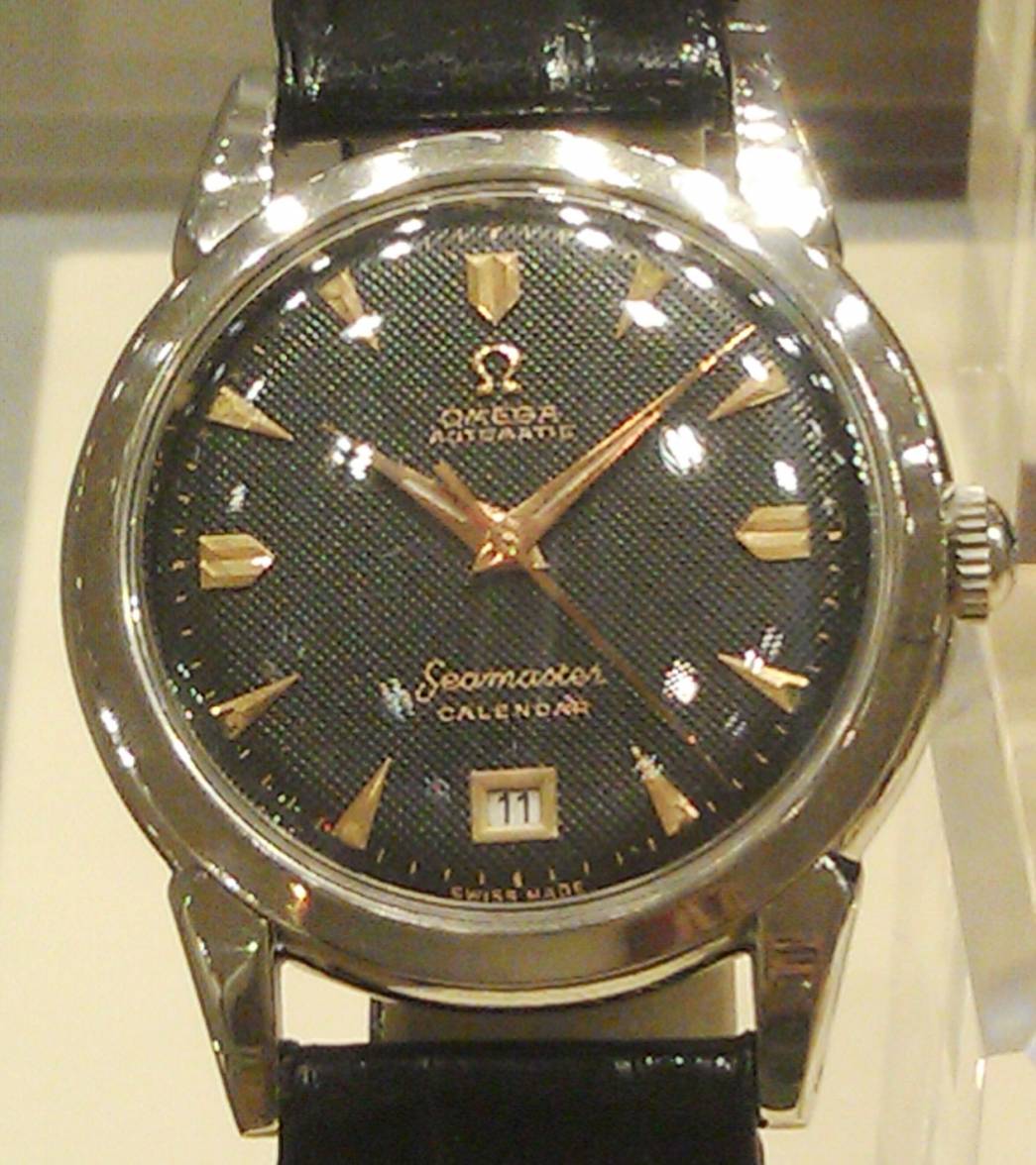 G6 Case 68 Seamaster SS black waffle dial date at 6.jpg