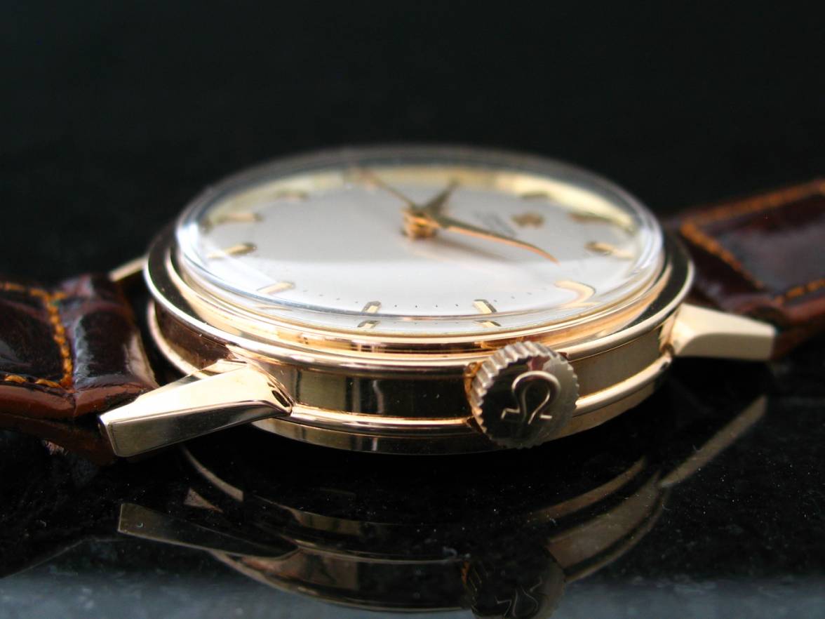 A Little Research on Omega watch case Made By Queens Watch Case Co