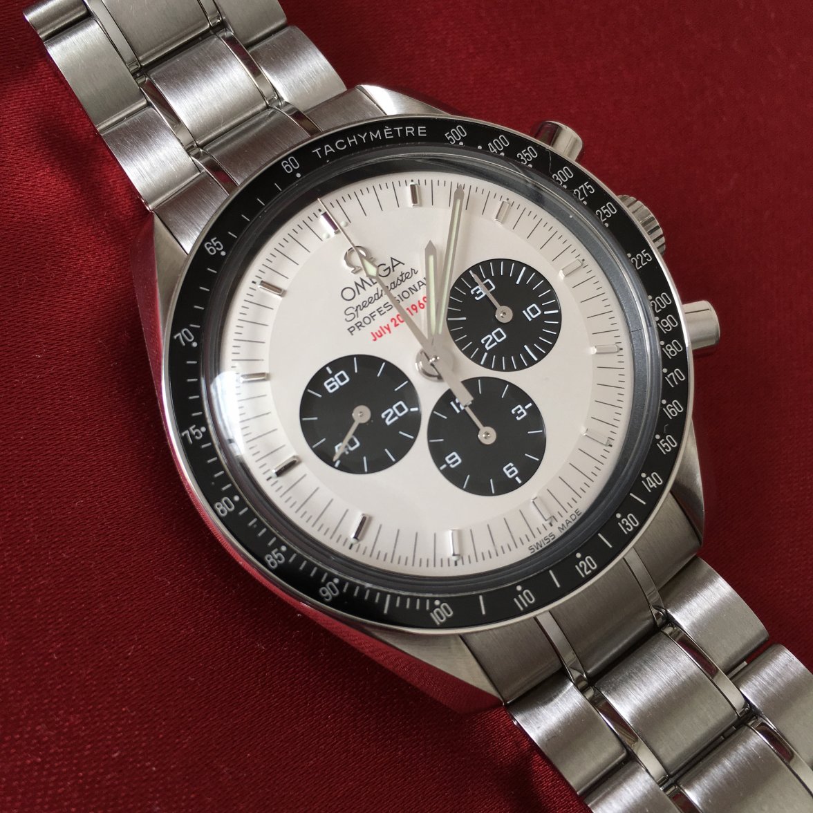 Omega Speedmaster - on red pillow - rotated.jpg