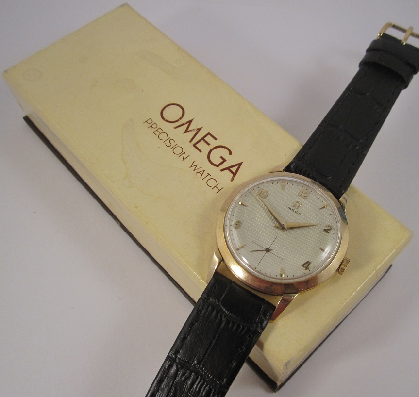 Omega 14K, på ask.jpg Omega 14K, på ask.jpg