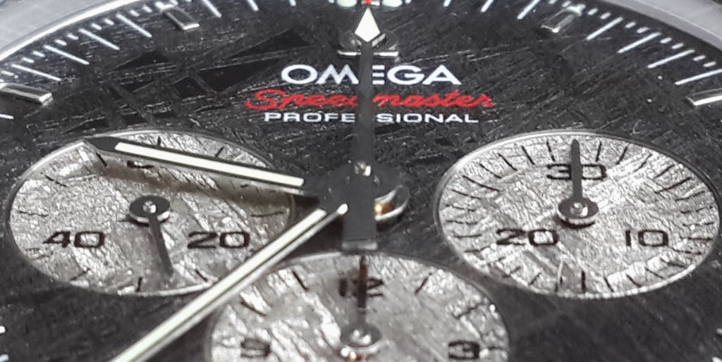 Speedy meteorite dial close up HR1 (1024x514).jpg