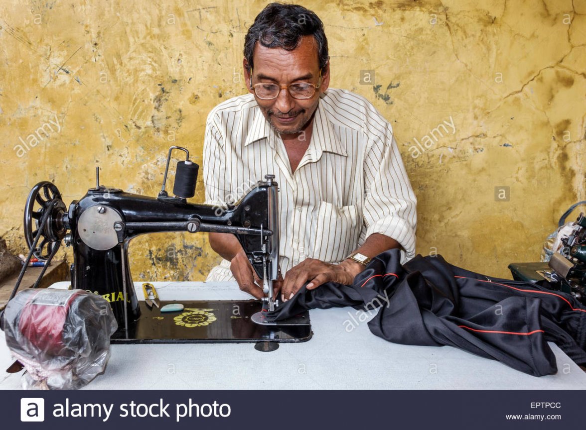 india-asian-mumbai-dharavi-60-feet-road-man-tailor-seamster-sewing-EPTPCC.jpg