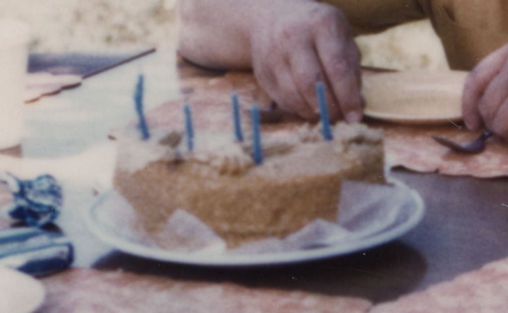 Lou_dad_6 years old w cake.jpg