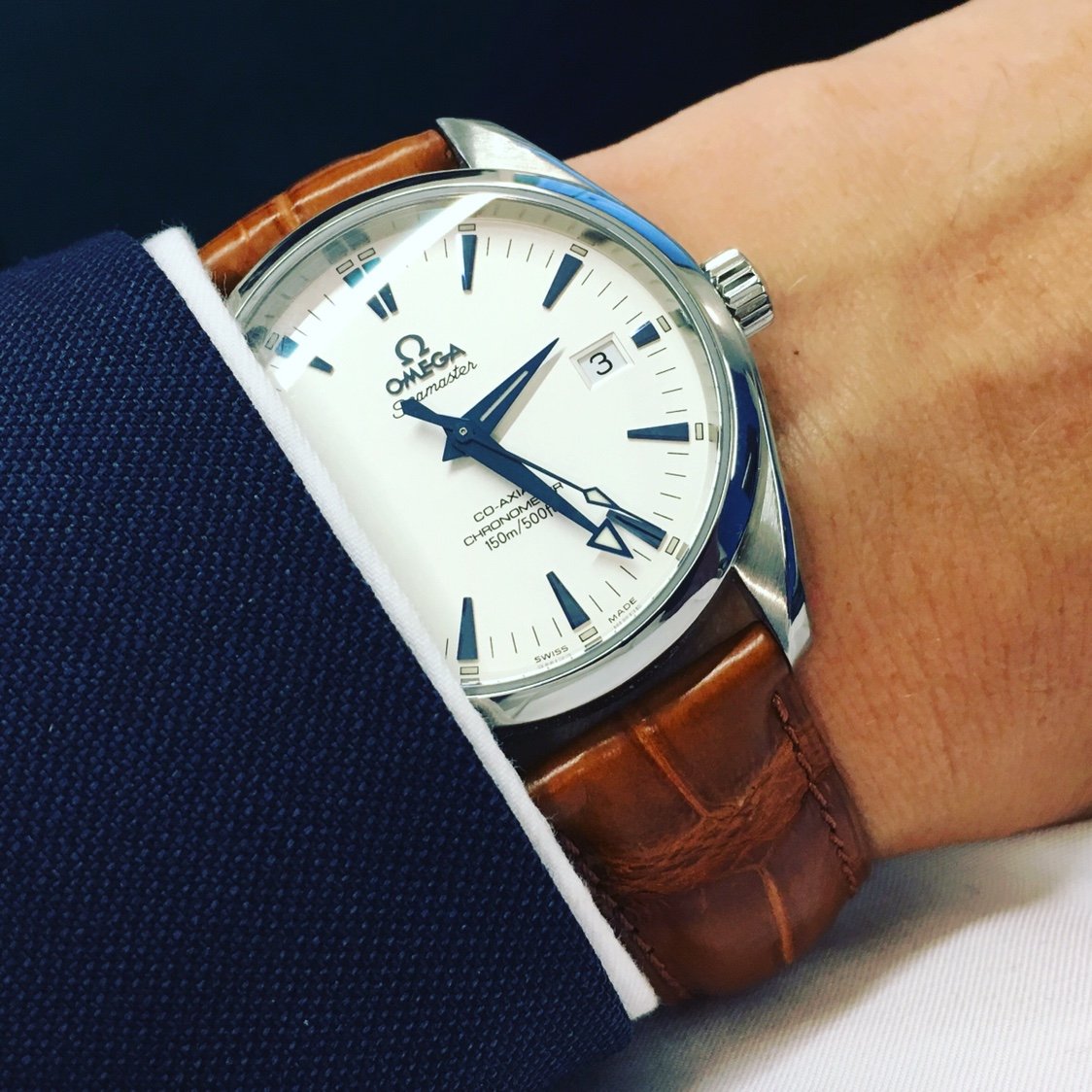 Omega aqua terra 2024 white dial blue hands