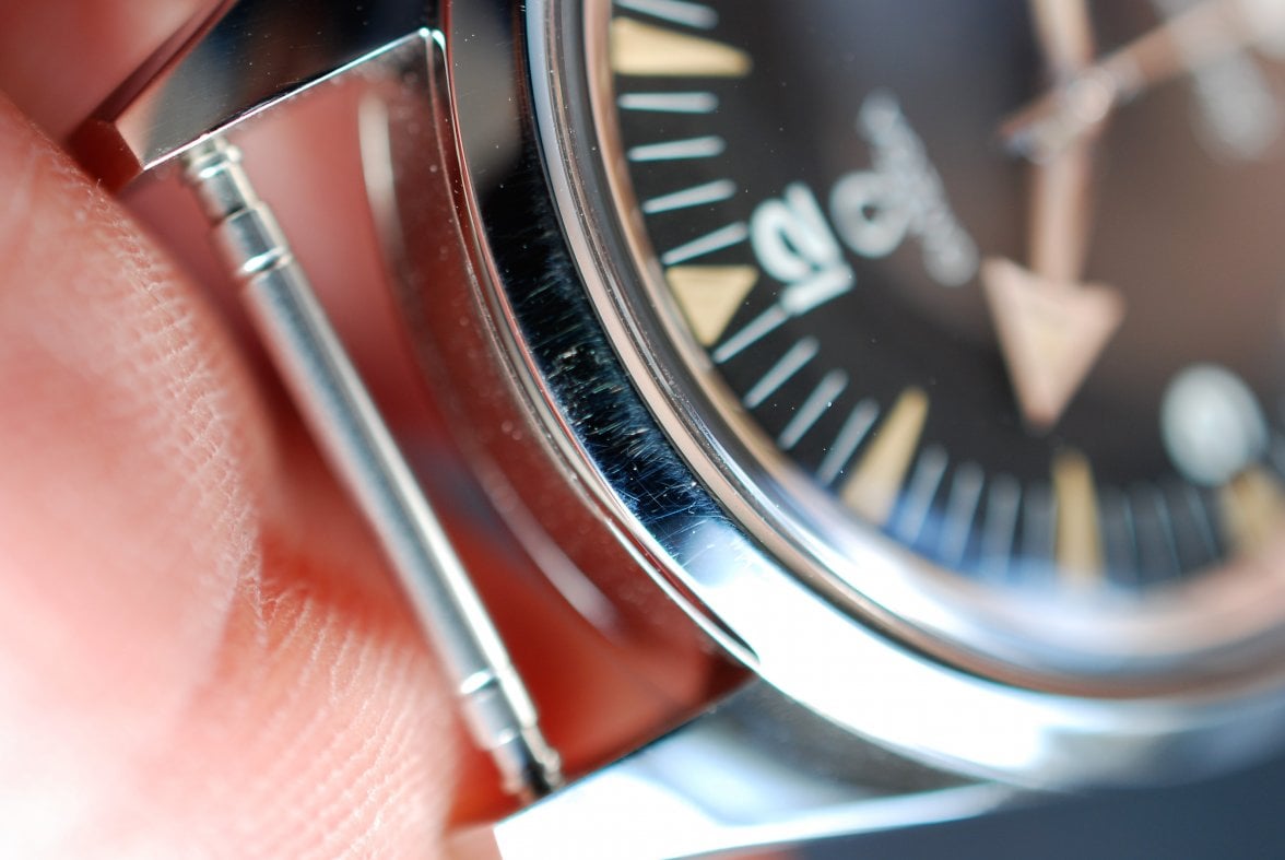 Photo 21 Railmaster Bezel Scratches at 12.jpg