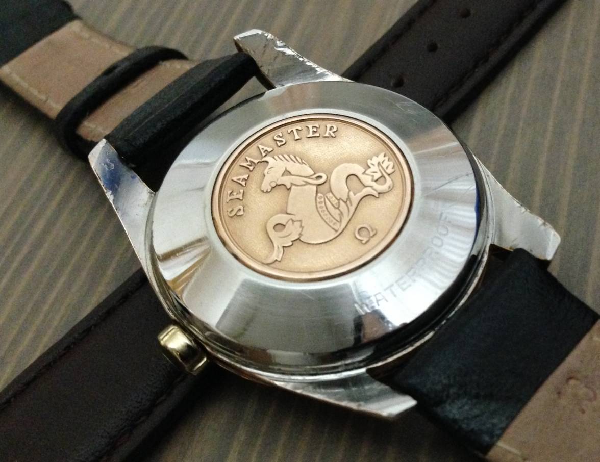 Rose gold Seamoster caseback logo.jpg