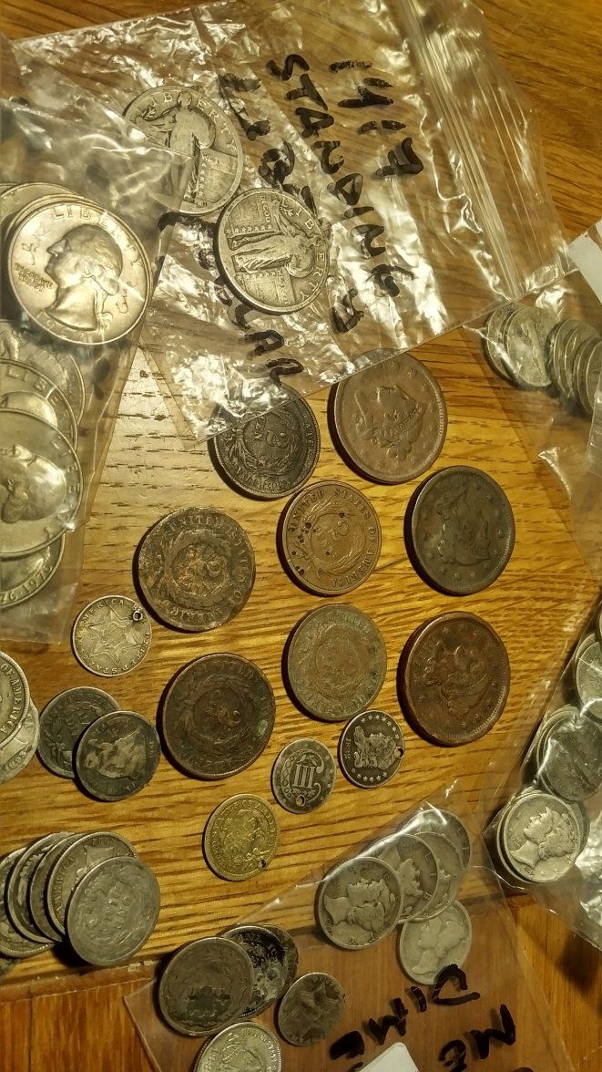 Any coin collectors here? What coins are you collecting? Omega Forums