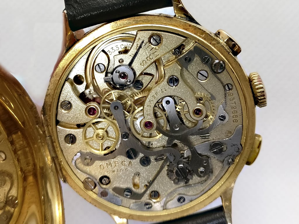 Omega chronograph. Часы Омега 750. Часы Омега 750 проба. Золотые наручные часы Omega 1946 г.com. Золотые наручные часы Омега.