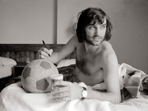 george-best-signing-football-in-his-hotel-room-in-marabella-spain-july-1972.jpg