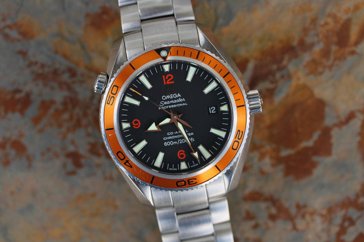 Seamaster planet ocean. Хомаж Омега сеамастер. Omega Seamaster Planet Ocean Orange. Omega Seamaster Калибр 351 1950. Omega Seamaster оранжевые.