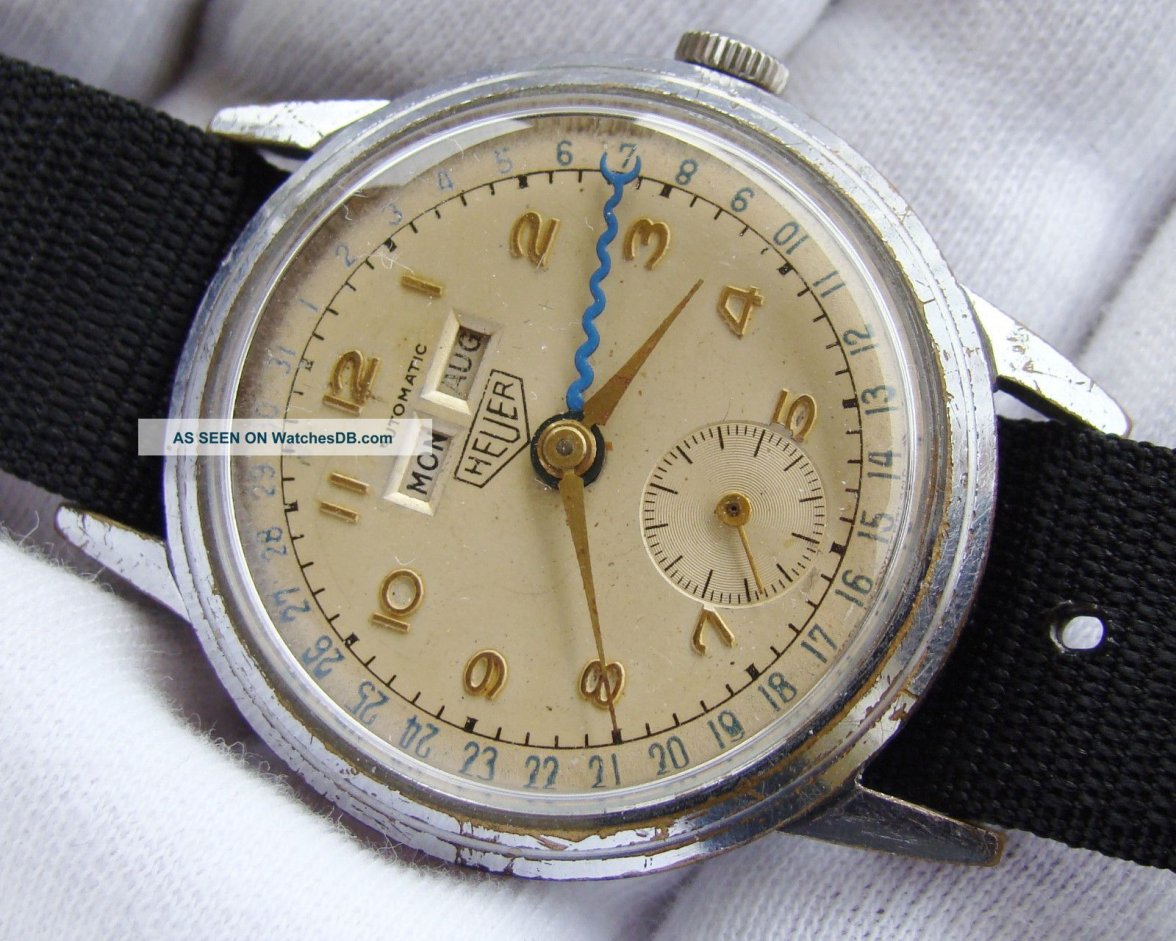 vintage_heuer_stainless_steel_triple_date_1940__s_automatic_bumper_movement_1_lgw.jpg