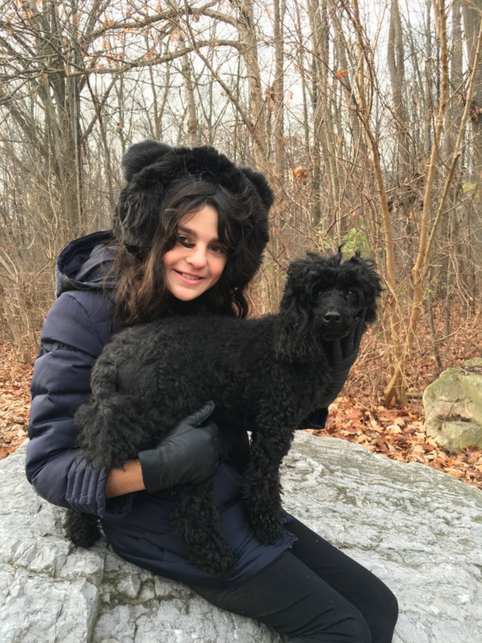 Jasmine with Allie on rock.jpg