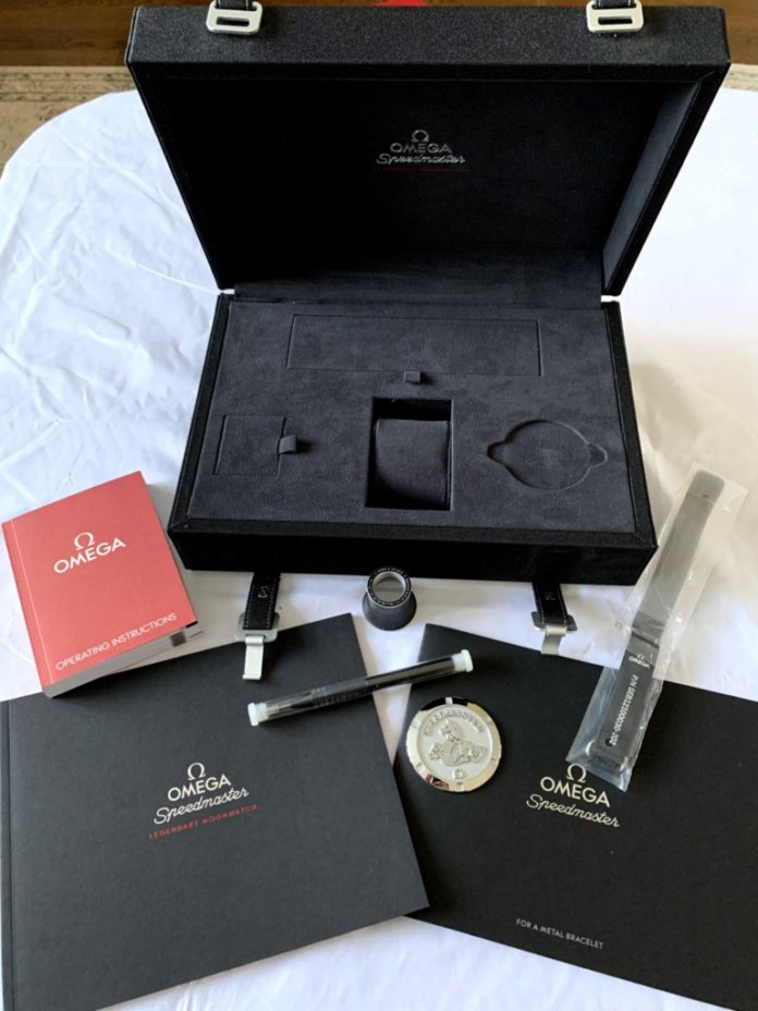 Speedmaster Moonwatch - box open with contents.jpg