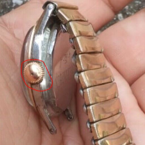Hole in watch crown.JPG Hole in watch crown.JPG